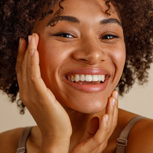 Closeup of woman with white teeth smiling